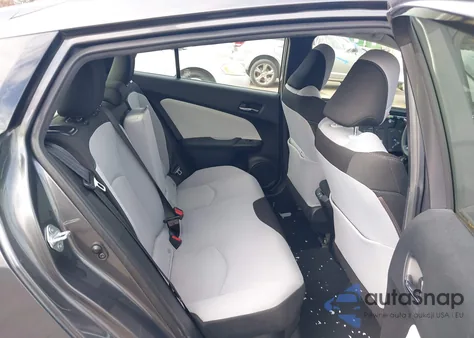 2021 Toyota Prius Le from USA, damaged, VIN JTDKAMFU1M3142837